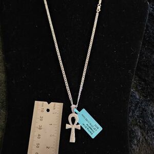 .87CTW VVSD Moissanite Ankh pendant in .925 sterling silver on 18" curb chain